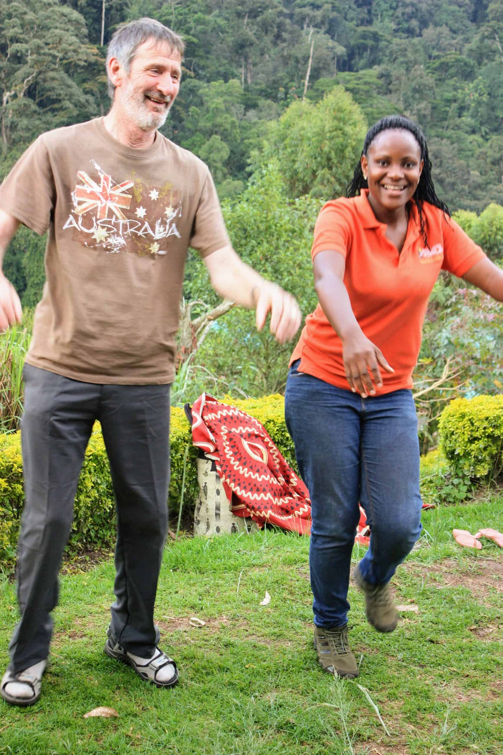 Our Guide With Our Guest Enjoying A Local Dance